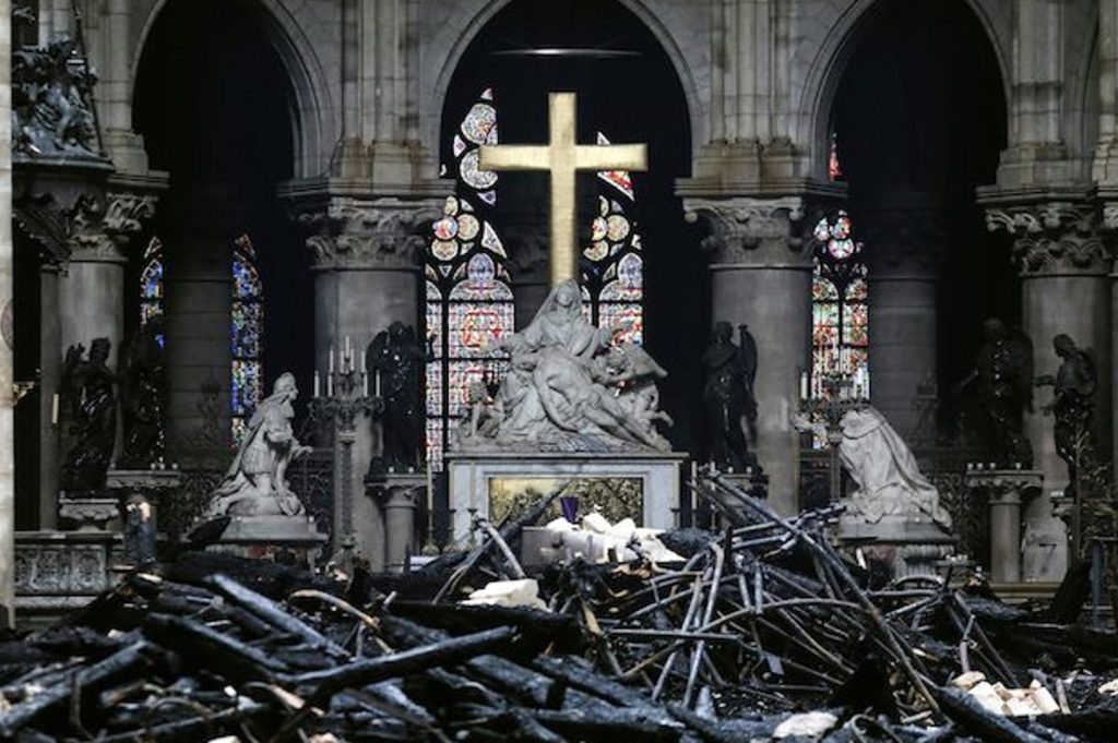 tom holland Notre-Dame stands charred in Paris in the aftermath of a fire that devastated the cathedral