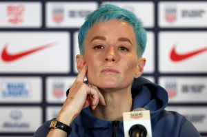 Megan Rapinoe #15 of Team United States speaks to members of the media (Photo by Sean M. Haffey/Getty Images)