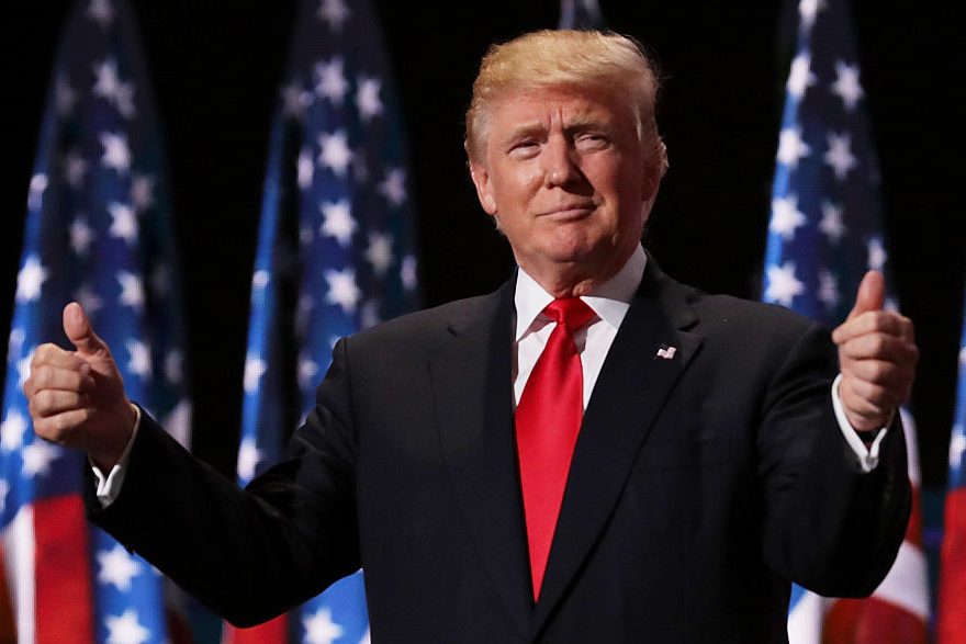 Republican presidential candidate Donald Trump gives two thumbs up (Photo by Chip Somodevilla/Getty Images)