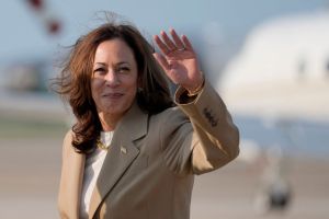 vVice President Kamala Harris waves as she returns to Joint Base Andrews in Maryland after attending a campaign fundraising event in Massachusetts on July 27, 2024 (Getty Images)