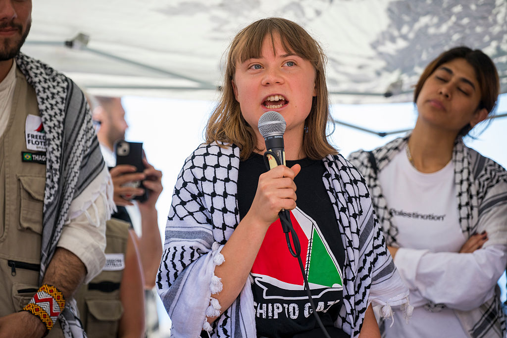 Greta Thunberg speaking at press conference (Getty)
